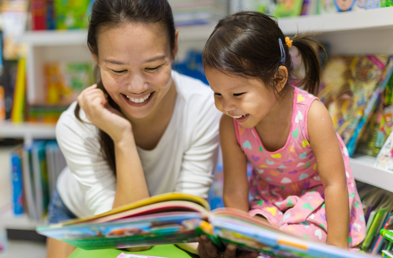 A mother and child reading