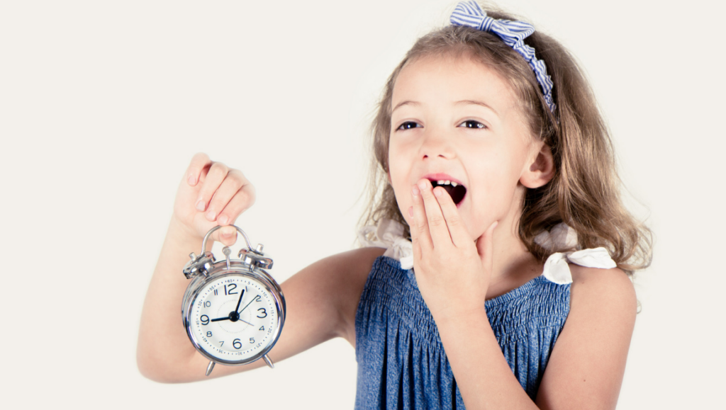 Child with clock that symbolises the time for time-out.