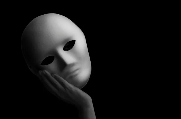 Een masker, als voorbeeld van het vechten tegen emoties.